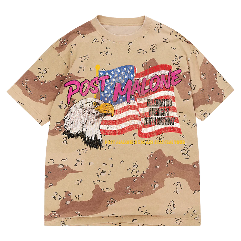Big Ass Stadium Tour Desert Camo Tee front view with desert camo print, Post Malone logo, eagle graphic, USA flag artwork, and tour text