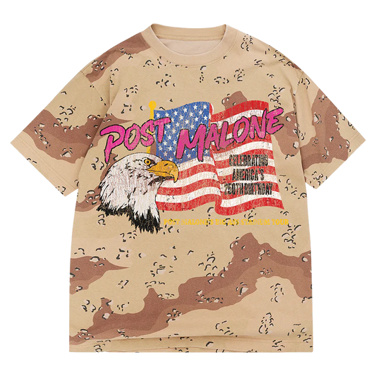 Big Ass Stadium Tour Desert Camo Tee front view with desert camo print, Post Malone logo, eagle graphic, USA flag artwork, and tour text