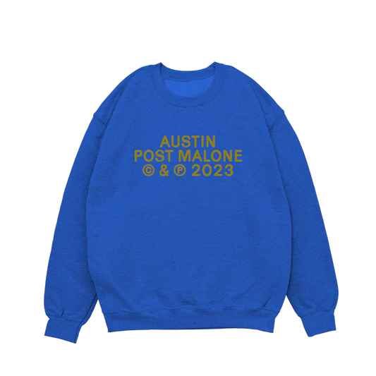 Post Malone Blue Tour Crewneck front view featuring Austin album branding and 2023 release artwork printed in gold on a royal blue heavyweight sweatshirt from the Austin merchandise collection