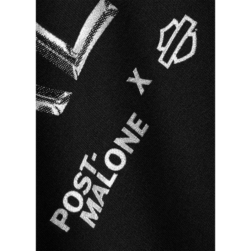 Close-up detail of Post Malone x Harley-Davidson Chrome Malone Hoodie featuring metallic chrome graphic typography and official collaboration branding on black fleece fabric