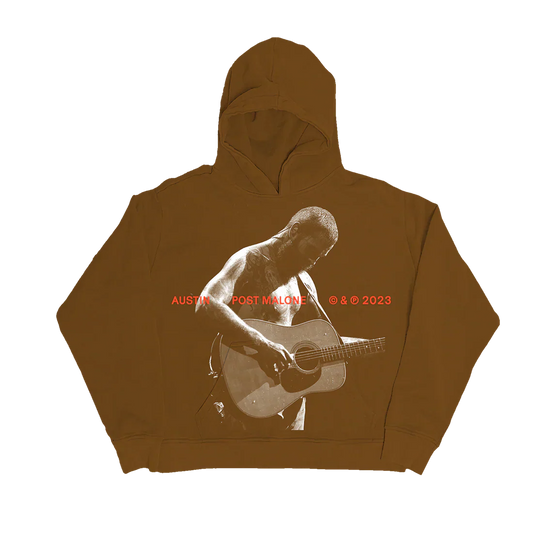 Post Malone Austin Guitar Hoodie front view featuring acoustic guitar performance photo artwork with Austin album inspired graphic on brown pullover hoodie