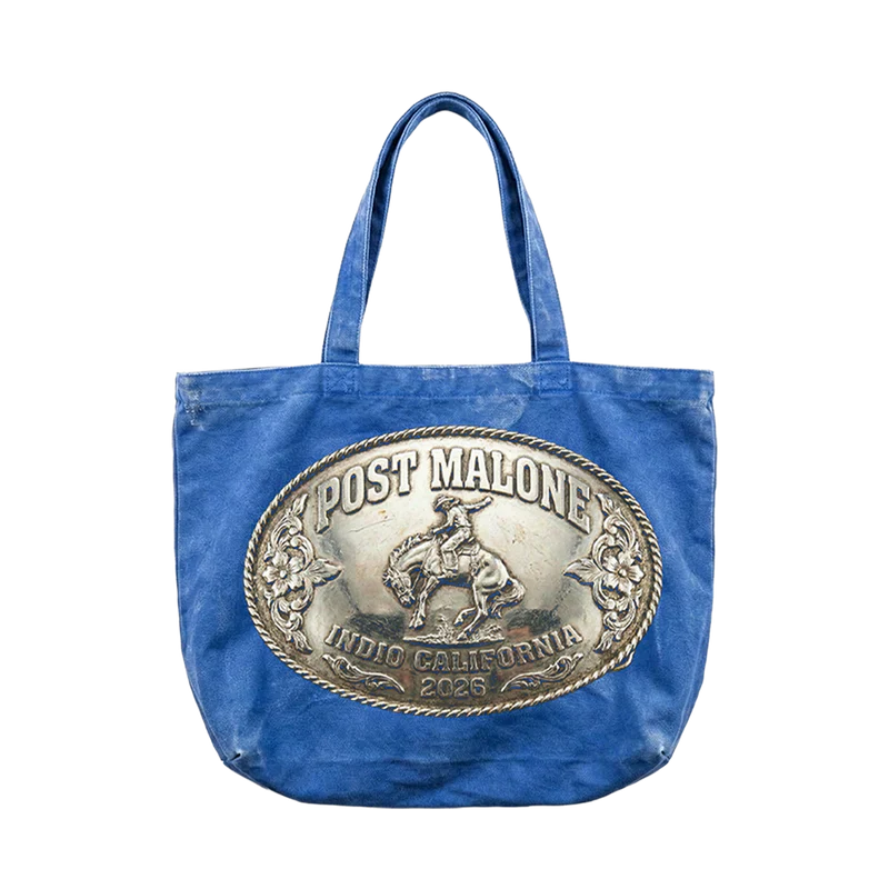 Post Malone Buckle Tote bag front view in blue featuring oversized Indio California 2026 western buckle graphic and rodeo inspired artwork design