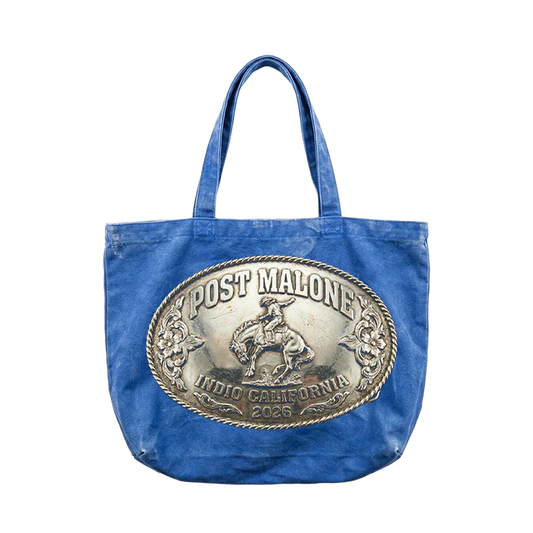 Post Malone Buckle Tote bag front view in blue featuring oversized Indio California 2026 western buckle graphic and rodeo inspired artwork design