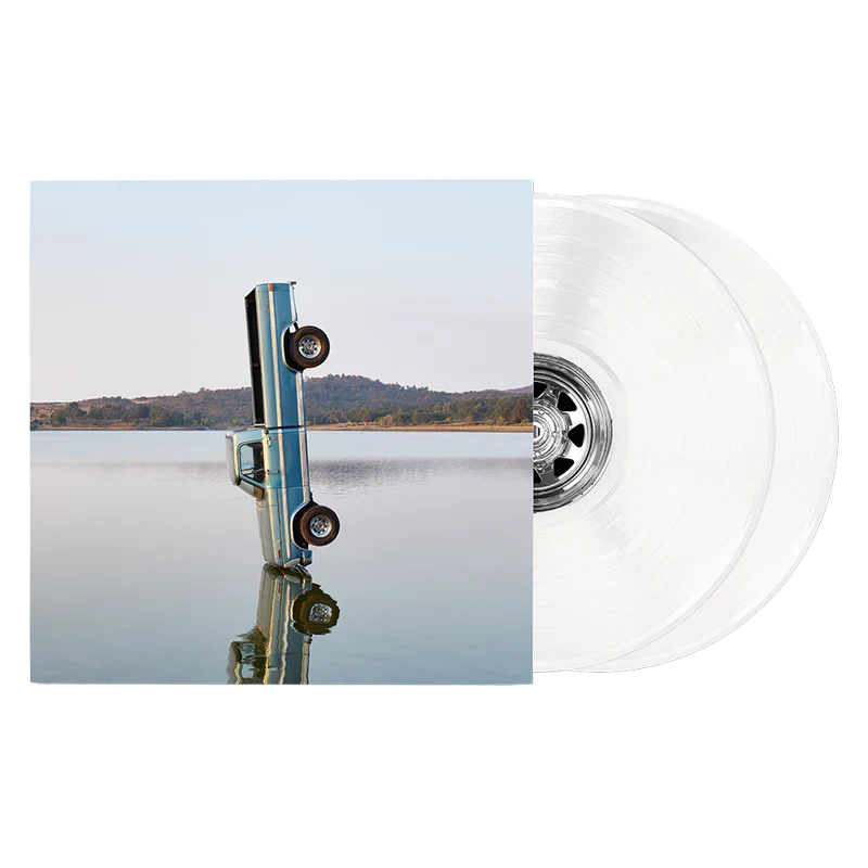 Post Malone F-1 Trillion Exclusive White Vinyl 2LP front view featuring album cover artwork with white double vinyl records displayed beside sleeve for collectors and fans
