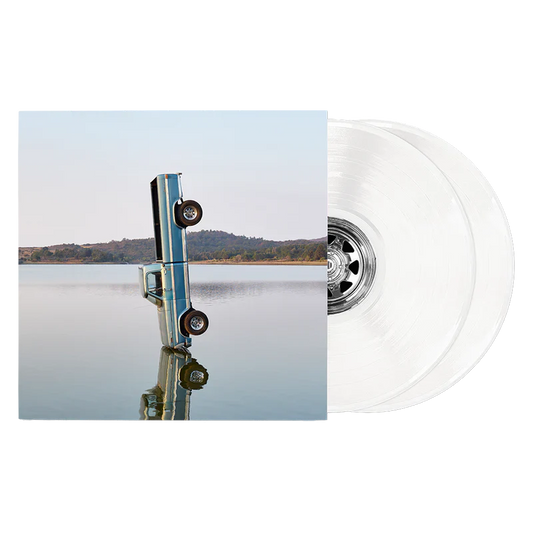 Post Malone F-1 Trillion Exclusive White Vinyl 2LP front view featuring album cover artwork with white double vinyl records displayed beside sleeve for collectors and fans