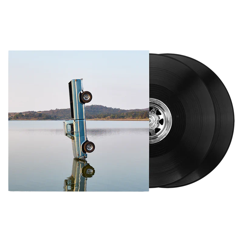 Post Malone F-1 Trillion vinyl 2LP front view featuring album cover artwork with black double vinyl records displayed beside sleeve for collectors and fans