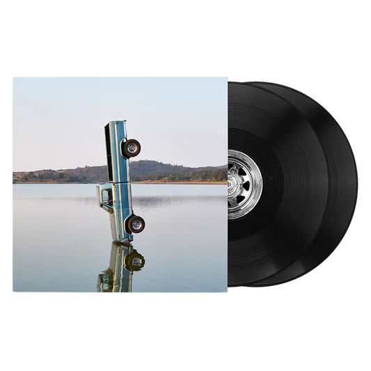 Post Malone F-1 Trillion vinyl 2LP front view featuring album cover artwork with black double vinyl records displayed beside sleeve for collectors and fans