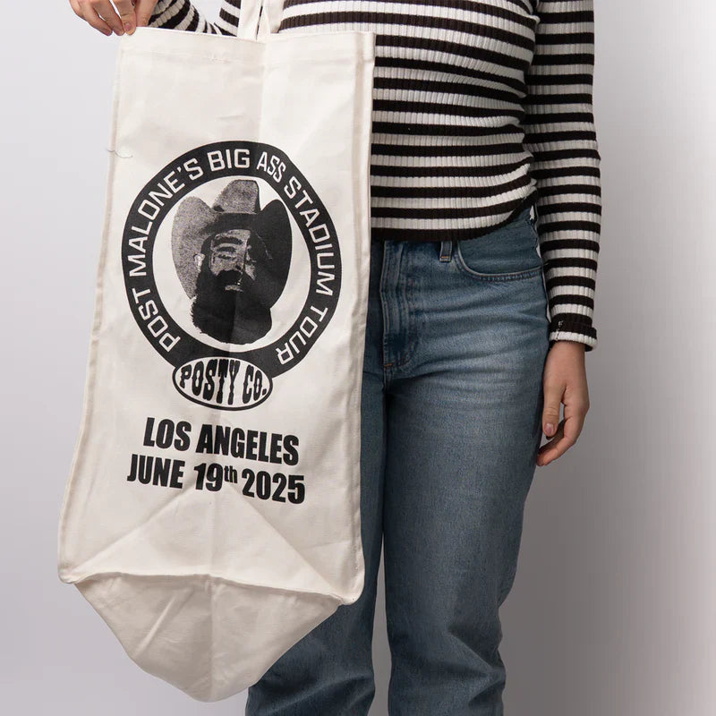 Post Malone LA Big Ass Stadium Tour tote bag lifestyle front view with Posty Co. portrait logo and event artwork
