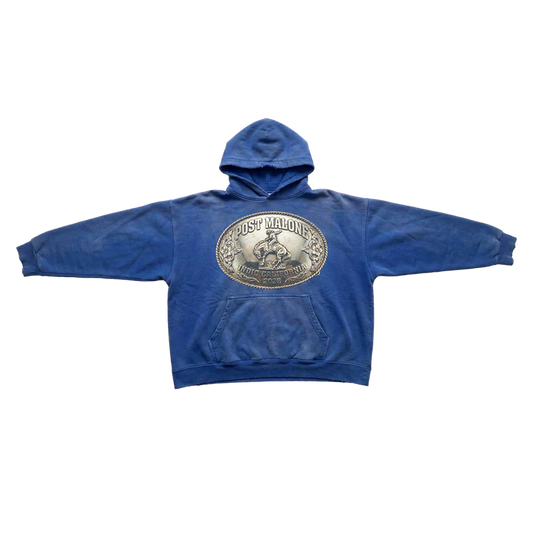 Post Malone Live In The Desert Buckle hoodie front view in blue featuring oversized Indio California western buckle graphic and kangaroo pocket