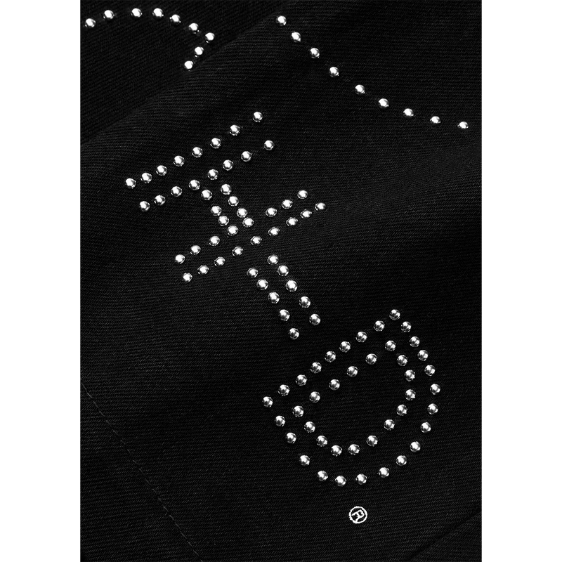 Close-up detail of rhinestone horse and Harley-Davidson inspired graphic artwork on Post Malone x H-D Studded Horsepower Denim Pants