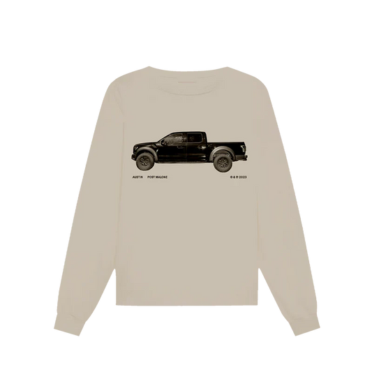 Post Malone Sand Truck Longsleeve front view featuring black pickup truck artwork inspired by the Austin album era, with Austin Post Malone 2023 branding printed on a vintage sand-colored long sleeve T-shirt