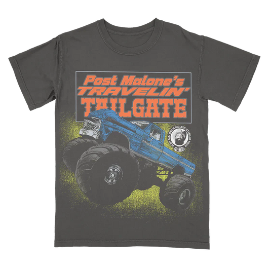 Post Malone Tailgate Tee front view featuring oversized monster truck artwork, Travelin’ Tailgate graphic, Posty Co branding, and Big Ass Stadium Tour inspired design printed on a vintage washed charcoal T-shirt