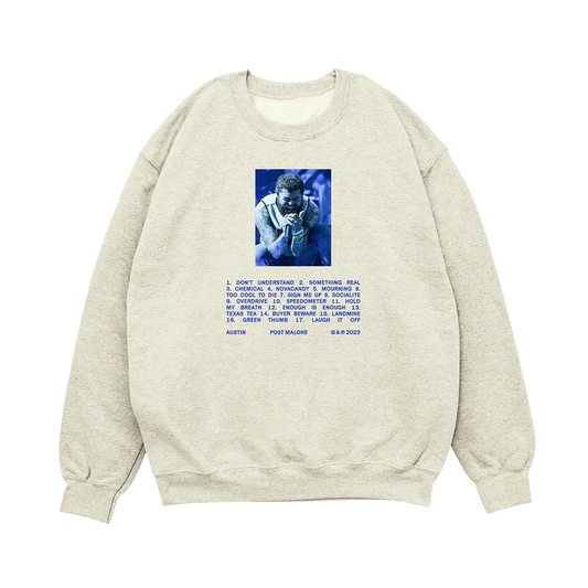 Post Malone Tracklist Crewneck front view featuring Austin album performance photography and complete tracklist artwork printed in blue on an oatmeal heavyweight sweatshirt from the Austin merchandise collection